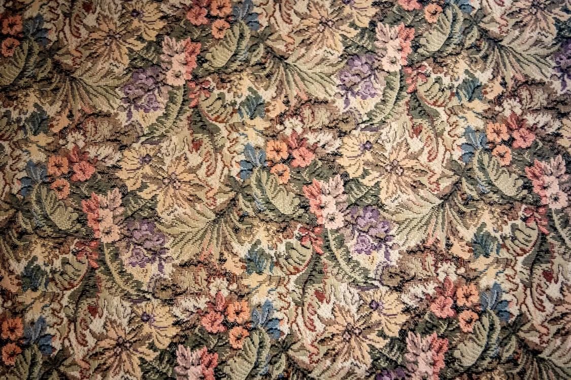 Floral tapestry-weave fabric detail for hospitality upholstery